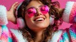 © Alexander LW - Stylish young woman in casual clothes listening to music on headphones and dancing.