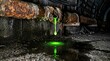 © Pix - Glowing liquid dripping from old pipes, toxic waste contamination, underground tunnel concept.