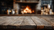 © Yuwarin - rustic wooden table foreground, blurred fire flames in background, warm orange glow
