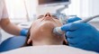 © Sugar Love Love - Cosmetic ultrasound treatment on patient's jawline
