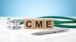 © Hasibul - Stethoscope and pen on a medical document with CME blocks