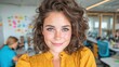 © svastix - A vibrant young woman with curly hair smiles warmly, showcasing her joyful personality in a cozy, colorful office environment filled with creative energy and teamwork.