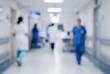 © MuhammadFirdaus - Blurred Hospital Corridor with Medical Staff in Motion