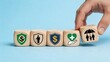 © Alex - Insurance Protection and Security Concept with Icons on Wooden Blocks for Family Health Life Coverage and Financial Safety