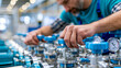 © Nataliya - Close-up of a man working on machinery with many valves and gauges in an industrial plant, industrial maintenance concept, plant operator at work, engineering close-up, defocused