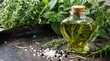© muhammadHafeez - Heart shaped glass bottle filled with golden rosemary infused oil