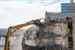 © Berit Kessler - Construction site, demolition of reinforced concrete structure, gutting and renovation, hydraulic hammer dismantles building, caterpillar excavator machine