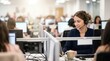 © Mr. Bolota - Customer service representative wearing a headset and working at her computer in a call center.