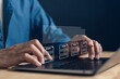 © Kiattisak - Writer typing news article on laptop with virtual document interface. Concept of online journalism, content creation, blogging and electronic media publishing.