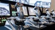 © Akbar - Polished Aluminum Flight Joysticks and Trigger Mechanisms in a Modern Aircraft Cockpit