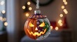 © kado - Halloween pumpkin Christmas ornament decoration.