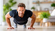 ©  VladaToday - Fit man doing push up style plank in bright home interior for home workout routine and strength training background