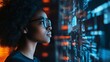 © Farah - Young woman wearing glasses looking at blue glowing digital data on a large vertical screen