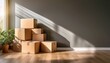 © Amy - cardboard boxes stacked in empty room with natural light
