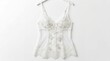© Rei - Elegant white lace camisole with delicate floral embroidery hanging on a simple hanger against a clean white background, showcasing feminine luxury