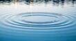 © waginah - Ripples on the surface of blue water, abstract background