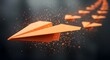 © Belawa art - Orange Paper Plane Leading a Group of Planes with Glowing Particle Trail Symbolizing Leadership and Innovation