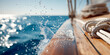 © agrus_aiart - polished wooden sailboat deck with white ropes and blue ocean water for luxury maritime vacation concept