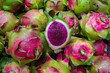 © robertharding - Dragon fruit displayed in a vegetable market in Dhaka, Bangladesh during daytime hours with vibrant colors