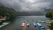 © robertharding - Boat jetty on Ritsa lake with boats and cloudy sky, Ritsa Relict National Park, in Russia during a cloudy day
