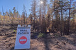 © robertharding - Trail closed sign shown along Cape Royal Road at Grand Canyon North Rim due to damage from Dragon Bravo Wildfire in 2025