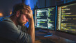 © Gold - Programmer frustrated by coding errors late at night in office ,stressed work in office, upset student in his room, student studing at night with stress, hard work of office worker