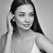 © Oleg Gekman - Portrait beautiful young woman with clean fresh skin. Model with healthy skin, close up portrait. Cosmetology, beauty and spa. Black and White photo