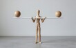 © YiuCheung - Wooden figure balances two spheres on a plank symbolizing equilibrium