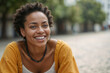 © polack - Beautiful Afro woman on a blurred background