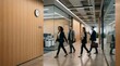 © Ada - Motion Blur of Busy Business People Walking in Modern Office Corridor with Copy Space