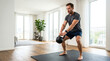 © Konstantin - Man doing kettlebell workout at home. Athletic male exercising with weights in modern living room. Healthy lifestyle and fitness concept. Copy space for text