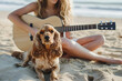 © Tetiana - Person spending a relaxing spring vacation on the beach with a guitar and a dog generative AI