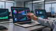 © AmDmLib - Analyzing financial data on multiple laptops