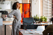 © Maria Vitkovska - Businesswoman stretching with back pain in modern office