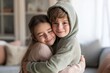 © Gulnaz - Twin siblings embrace warmly, eyes closed in contentment