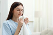 © New Africa - Woman with fresh clean towel at home, space for text