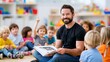 © CreativeArt - Male teacher reading book to diverse children