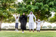 © oneinchpunch - Happy family spending time together outdoor in Dubai