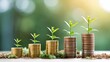 © Harry - A stack of coins with growing plants represents financial growth and investment in a natural setting.