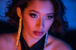 © Bliss - Enchanting night allure of a young woman in vibrant club atmosphere