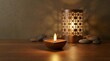 © ENDRA - Tranquil spa setting with candle and decorative lantern
