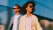 © World of AI - Two office workers in casual attire walking outside a modern building, one wearing sunglasses and a light jacket, the other in a striped shirt and light coat