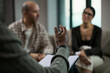 © DragonImages - Middle aged couple attending counseling session, listening during divorce mediation with therapist taking notes. Ideal for relationship conflict, separation support, legal guidance marketing