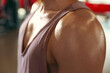 © New Africa - Man with sweat on his body in gym, closeup