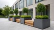 © buraratn - Modern urban landscaping with geometric planters and lush greenery in a contemporary architectural setting