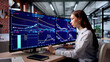 © Andrey Popov - Young Woman Studies Stock Market Data On Computer