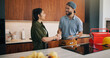 © peopleimages.com - Happy, woman and handshake with plumber in home for welcome, introduction and maintenance deal. Person, shaking hands and technician with tablet, thank you and pricing agreement for plumbing services
