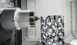 © Andrei Armiagov - CNC milling machine processing an aluminum aerospace part.
