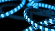 © jannik27s - A close-up view of a blue LED light strip on a black background