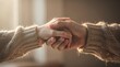 © PengAI - Two people gently holding hands, conveying warmth, support, and connection in a cozy setting.